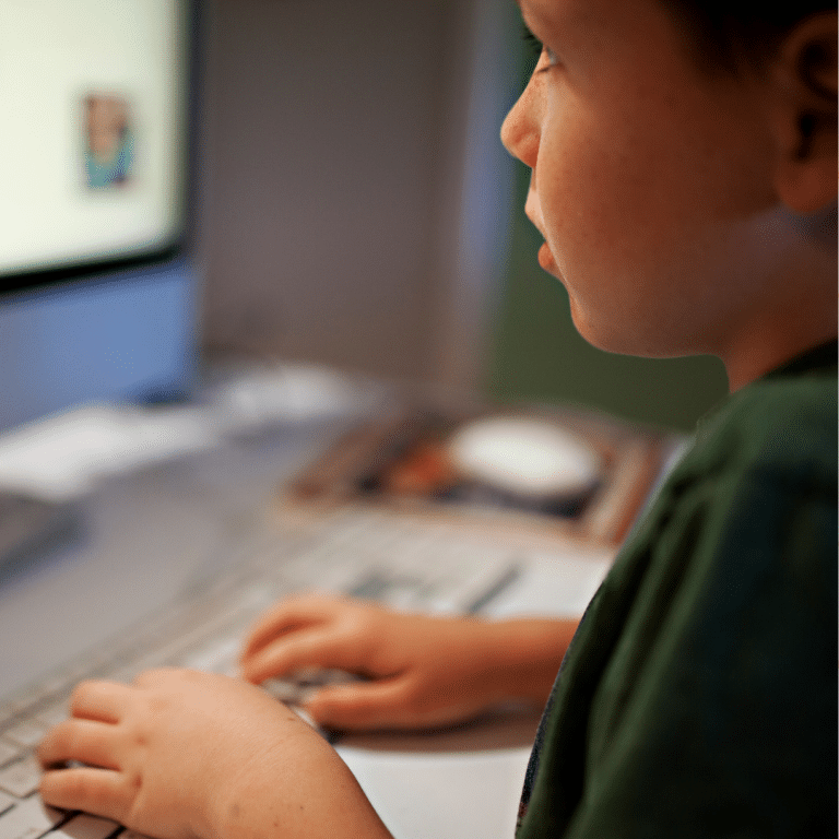 child using khan academy on computer